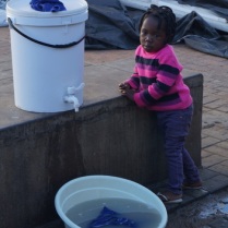 Little girl at open market